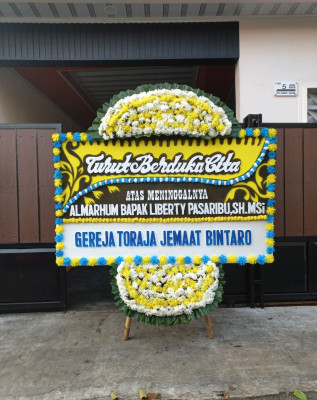 Papan Bunga Duka di Mimika Baru